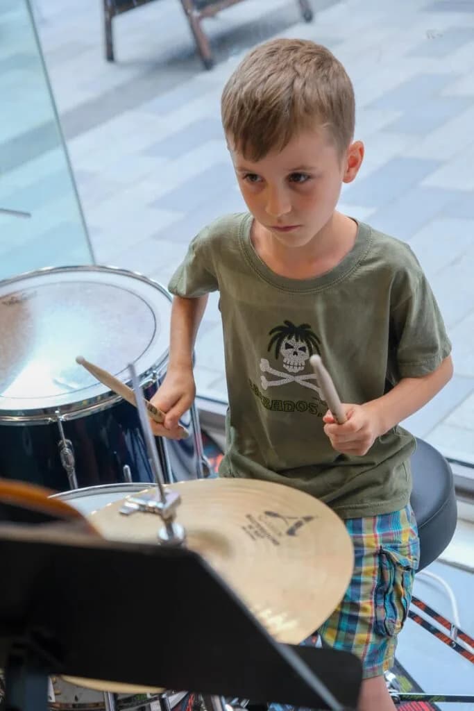 Boy playing the drums.