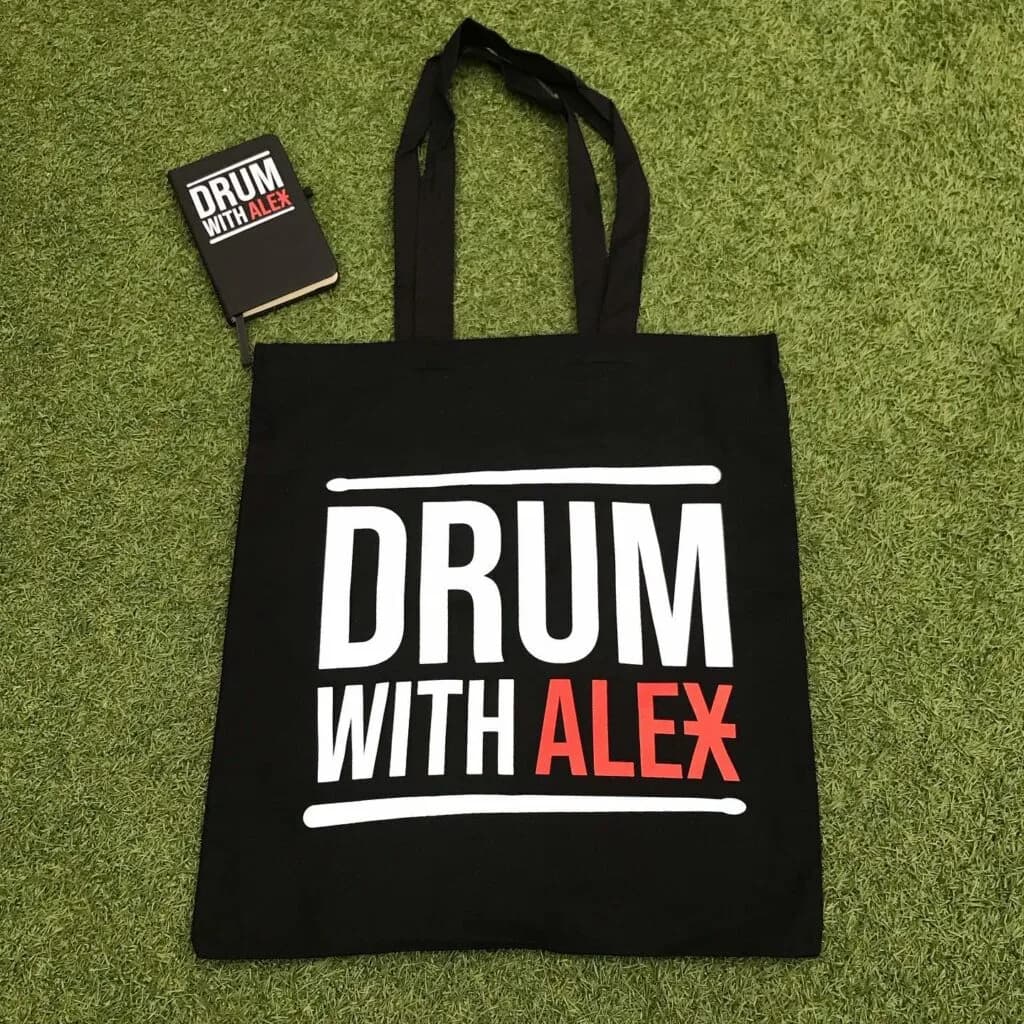 Drum With Alex tote bag and practice notebook.