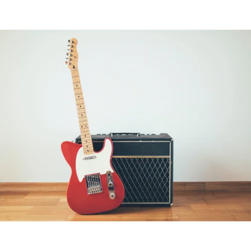 Electric guitar with amplifier in a music studio