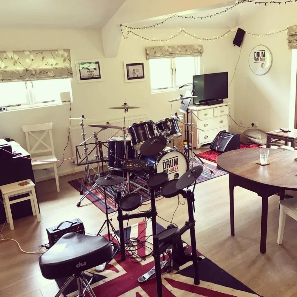 Drum lessons gift in a private lesson setting with a fully set-up drum kit