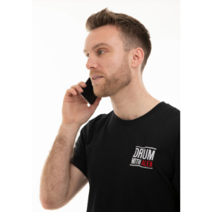 Drum teacher communicating with parents to discuss effective drum practice methods.